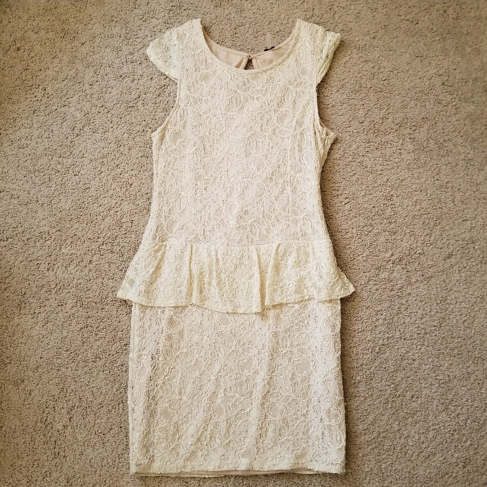 Blush lace peplum dress